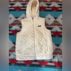 Patagonia reversible hooded vest, women’s medium. Excellent condition!